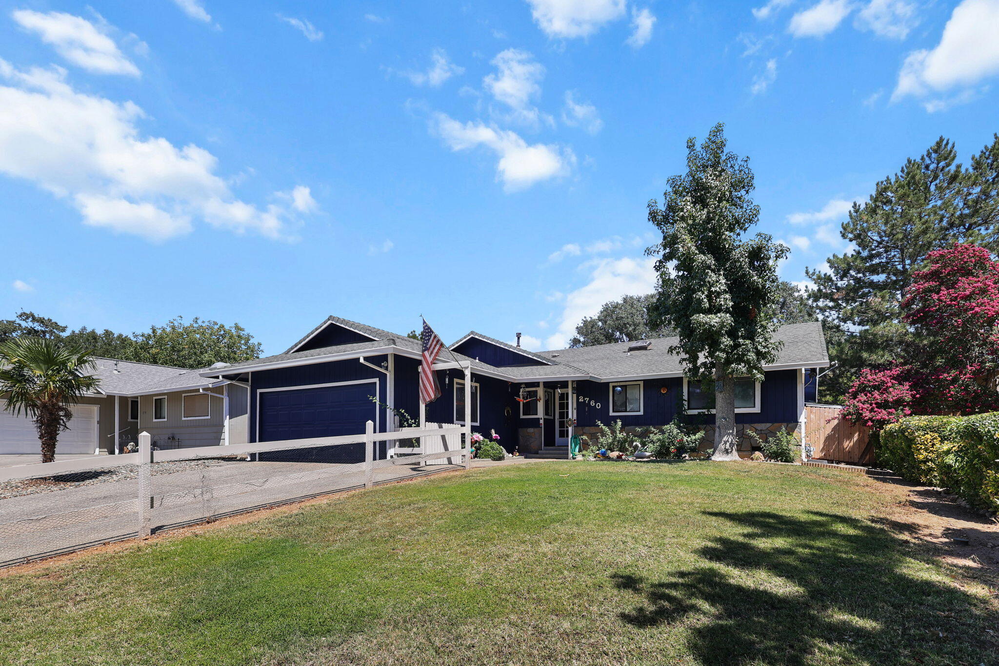 2760 Oriole Drive Red Bluff, CA 96080 - Photo 23 of 25 a front view of a house with a garden