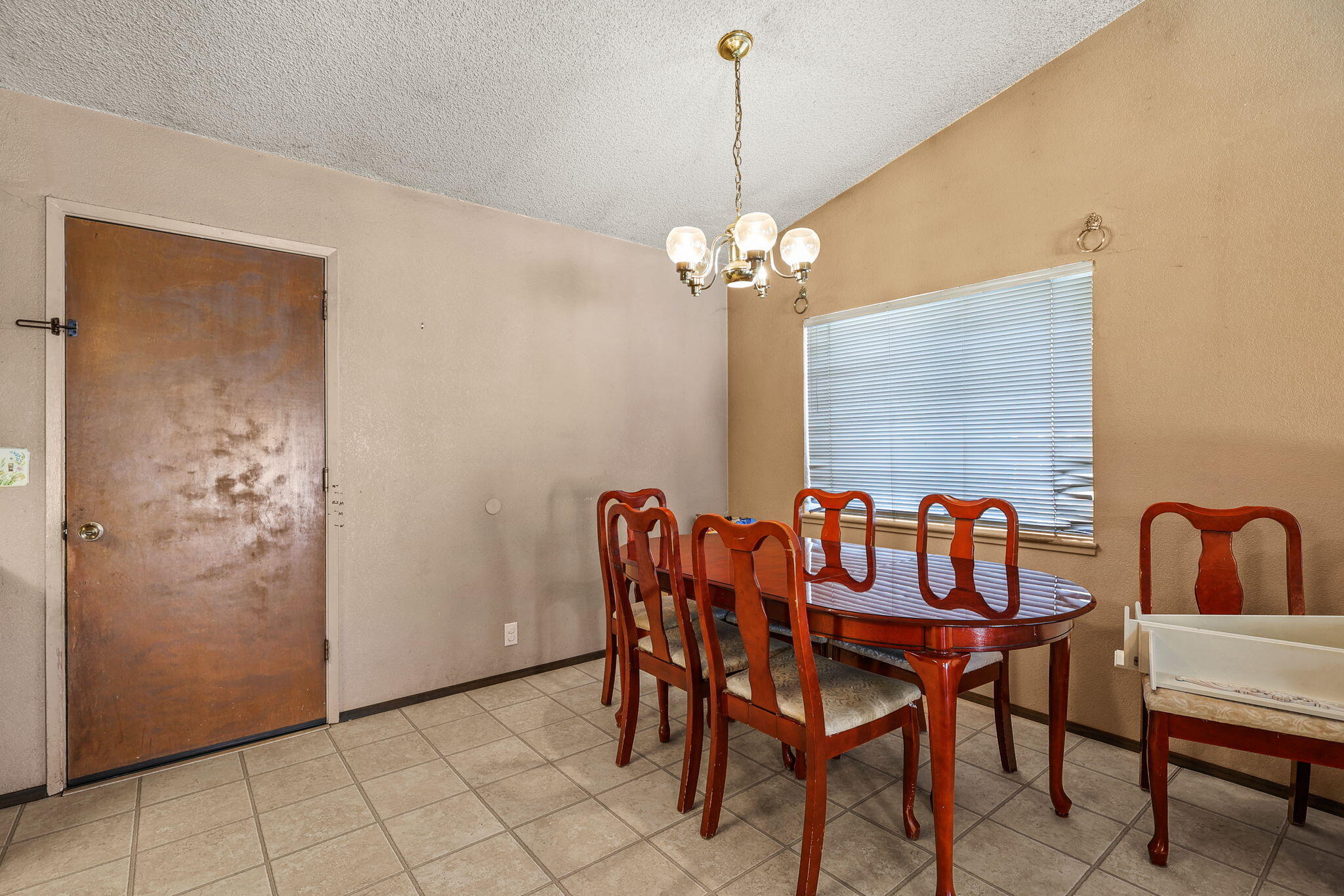 2760 Oriole Drive Red Bluff, CA 96080 - Photo 9 of 25 a view of a dining room with furniture and chandelier