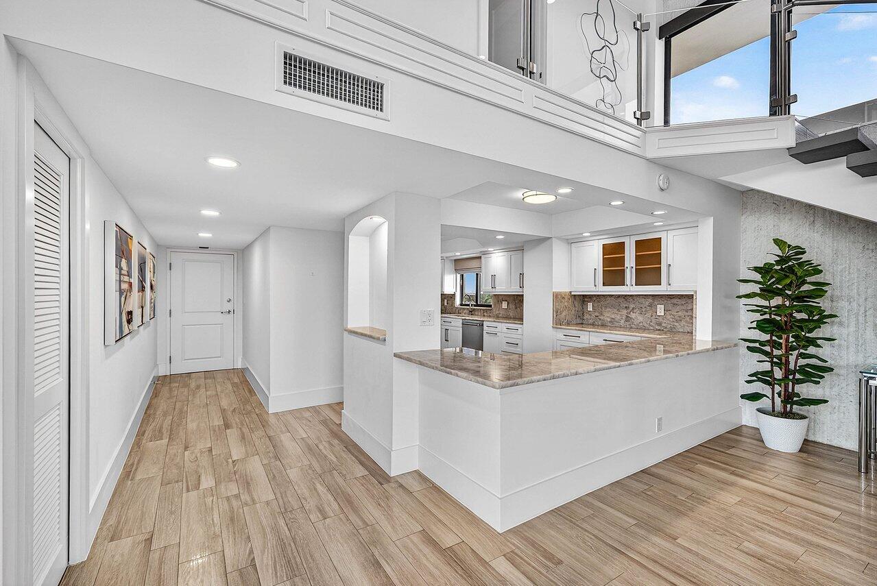 900 Northeast Spanish River Boulevard, Unit 7E Boca Raton, FL 33431 - Photo 16 of 71 OPEN KITCHEN CONCEPT
