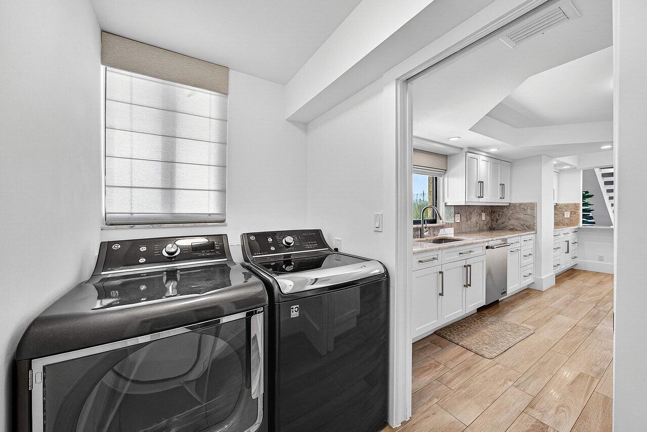 900 Northeast Spanish River Boulevard, Unit 7E Boca Raton, FL 33431 - Photo 23 of 71 LAUNDRY ROOM