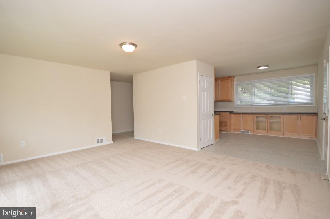 4429 Roundhill Road Alexandria, VA 22310 - Photo 13 of 24 Living Room opens to Kitchen