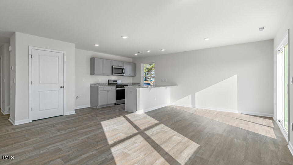 38 Red Clover Drive Angier, NC 27501 - Photo 16 of 37 Living and Dining Area