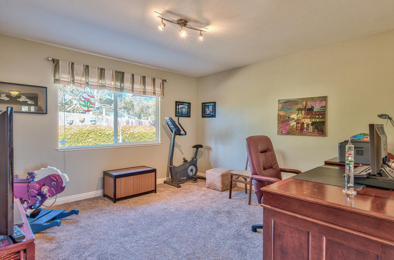 18401 Moro Road Salinas, CA 93907 - Photo 18 of 39 a view of a workspace with furniture and a window