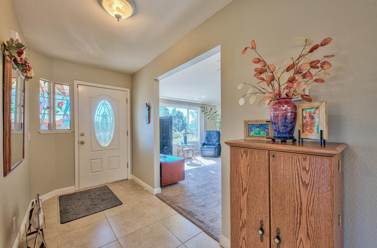 18401 Moro Road Salinas, CA 93907 - Photo 7 of 39 a living room with furniture and a potted plant