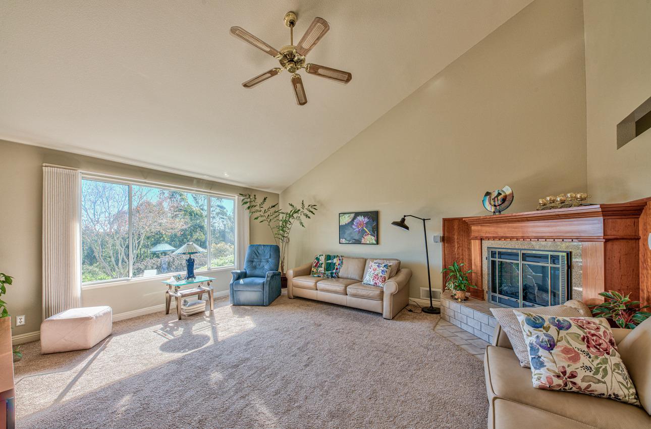 18401 Moro Road Salinas, CA 93907 - Photo 8 of 39 a living room with furniture and a fireplace