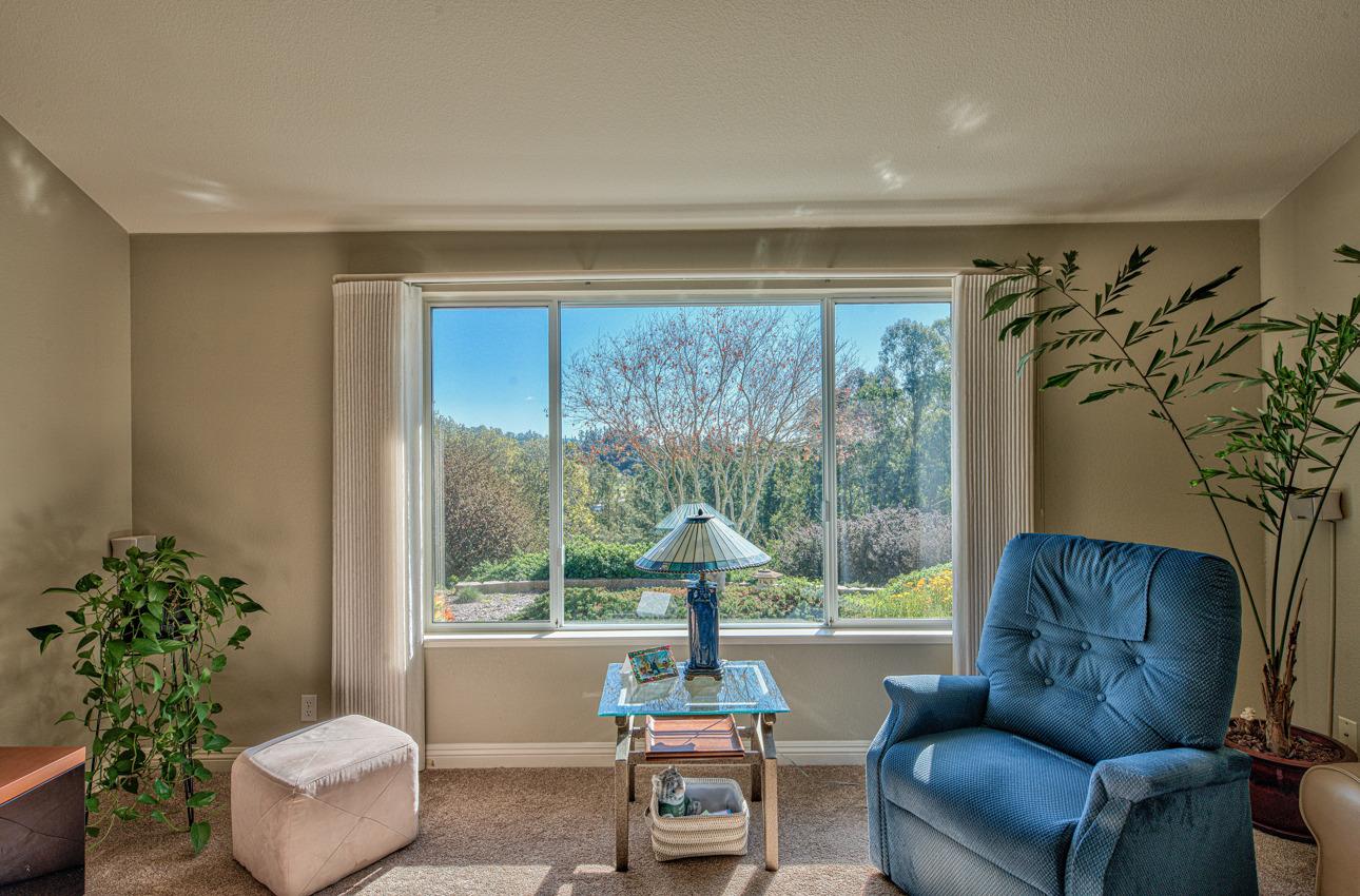 18401 Moro Road Salinas, CA 93907 - Photo 9 of 39 a living room with furniture and a large window