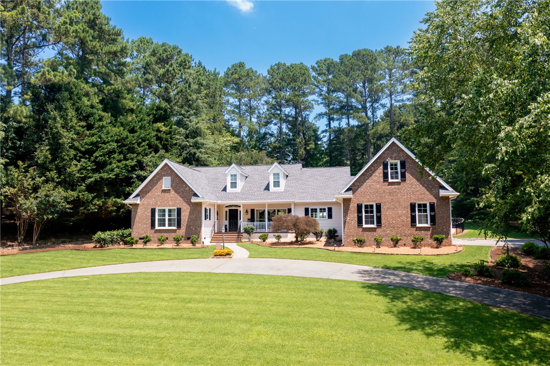 Located in the sought-after Emerald Pointe subdivision on Lake Keowee, this stunning 4BR/4.5BA, 3,408 square foot home sits on a beautifully landscaped 0.97-acre interior lot and includes a coveted community boat slip #12.