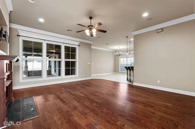 a open kitchen with stainless steel appliances granite countertop a sink and a refrigerator