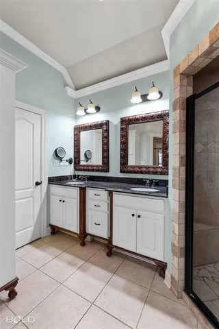 a bathroom with a bathtub and shower