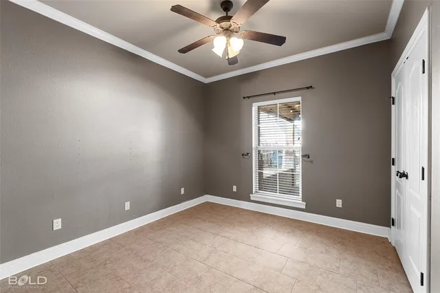 a room with a stove and a desk