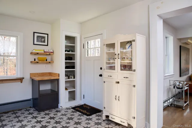 a view of a bedroom with closet and wooden floor