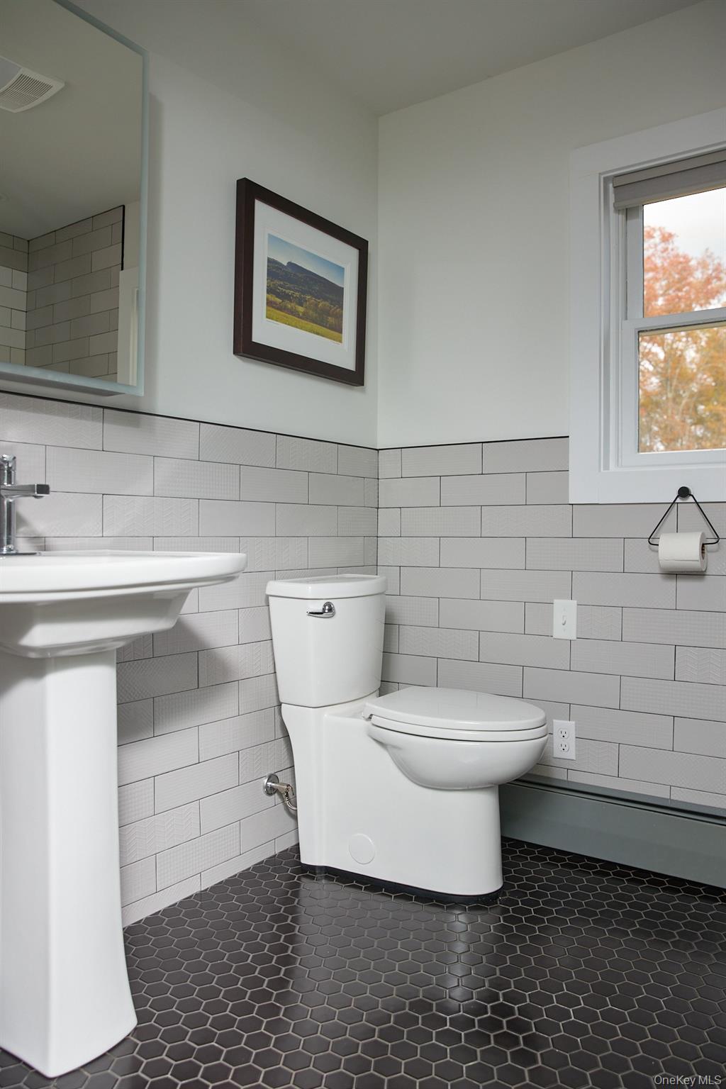 2917 Rte 44 55 Gardiner, NY 12525 - Photo 27 of 33 a bathroom with a toilet sink and mirror