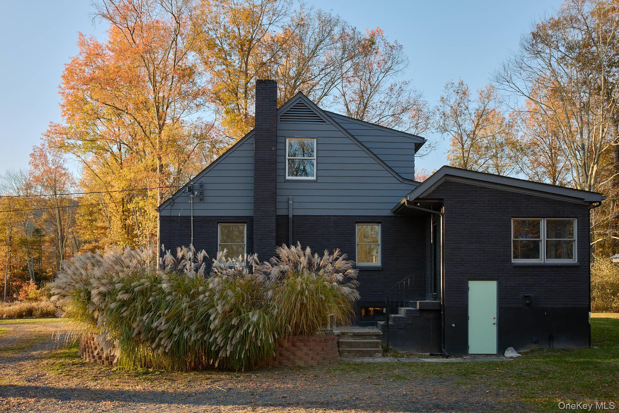 2917 Rte 44 55 Gardiner, NY 12525 - Photo 3 of 33 a house that has a tree in front of the house