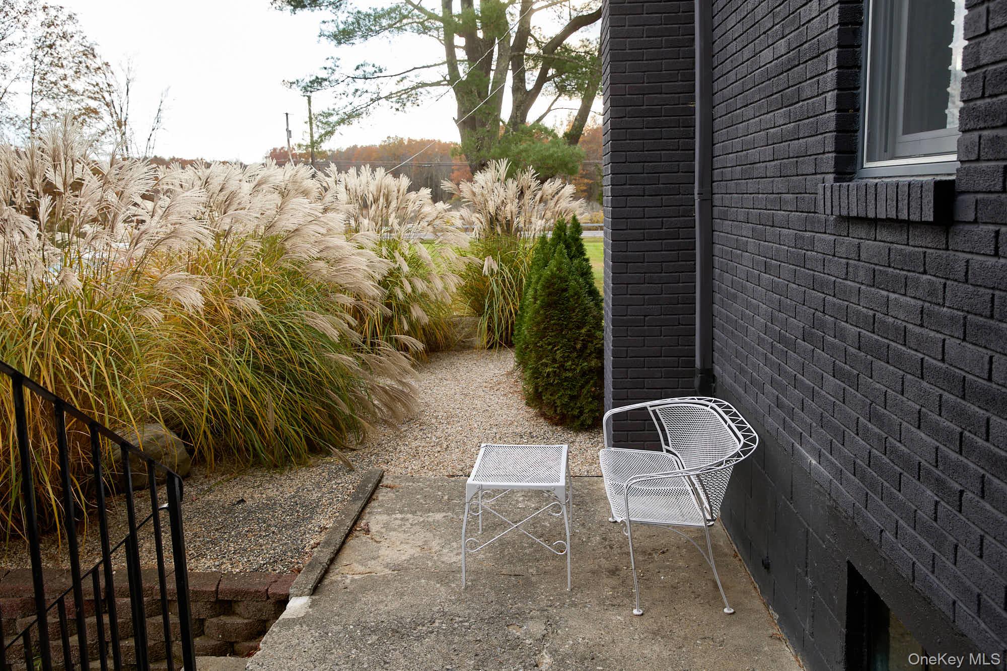 2917 Rte 44 55 Gardiner, NY 12525 - Photo 7 of 33 a view of a yard with plants and brick wall