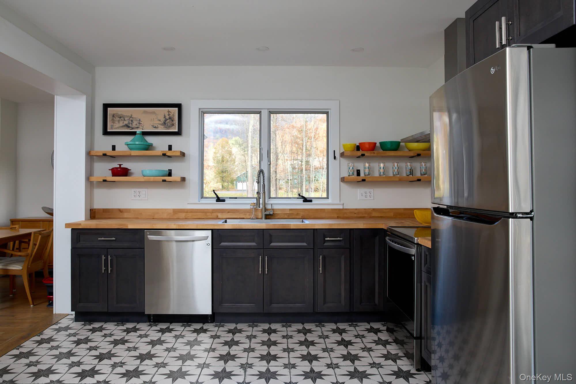 2917 Rte 44 55 Gardiner, NY 12525 - Photo 9 of 33 a kitchen with stainless steel appliances granite countertop a refrigerator and a sink