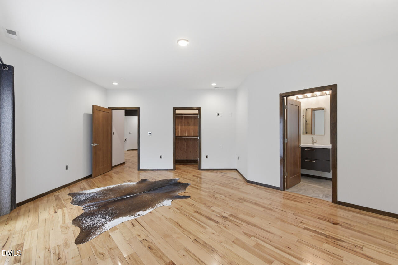 3315 Denada Path Durham, NC 27707 - Photo 37 of 74 a view of an empty room with wooden floor