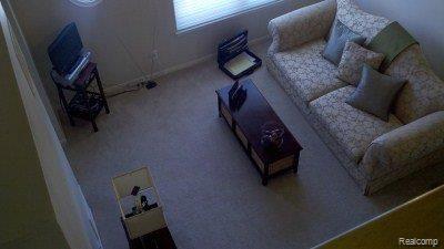 16856 Farmington Road, Unit 64 Livonia, MI 48154 - Photo 5 of 21 2nd view of Liv. Room.jpg