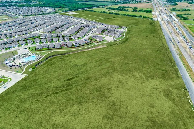 a view of a backyard with a garden