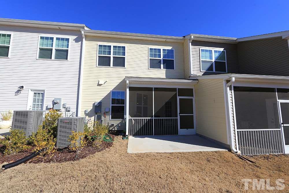 6108 Beale Loop Raleigh, NC 27616 - Photo 17 of 19 a view of a house with a window and pathway