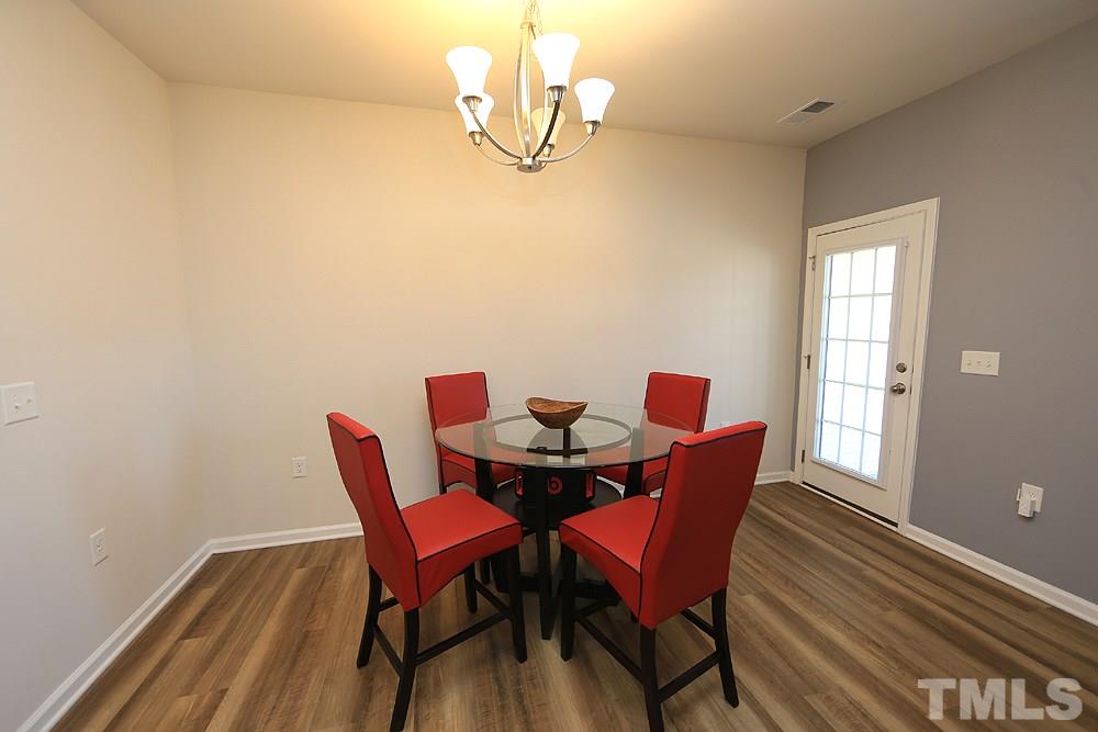 6108 Beale Loop Raleigh, NC 27616 - Photo 4 of 19 a dining room with furniture and window