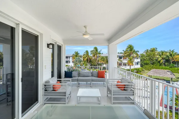 a view of a porch with furniture