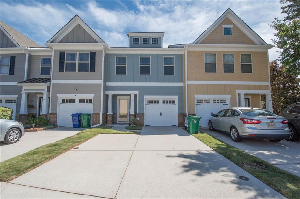 2674 Avanti Way Decatur, GA 30035 - Photo 1 of 1 a front view of a house with a yard