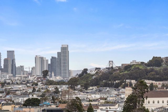 a view of a city with tall buildings in the background