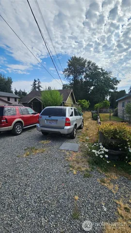 a childrens park with lots of swings and slides