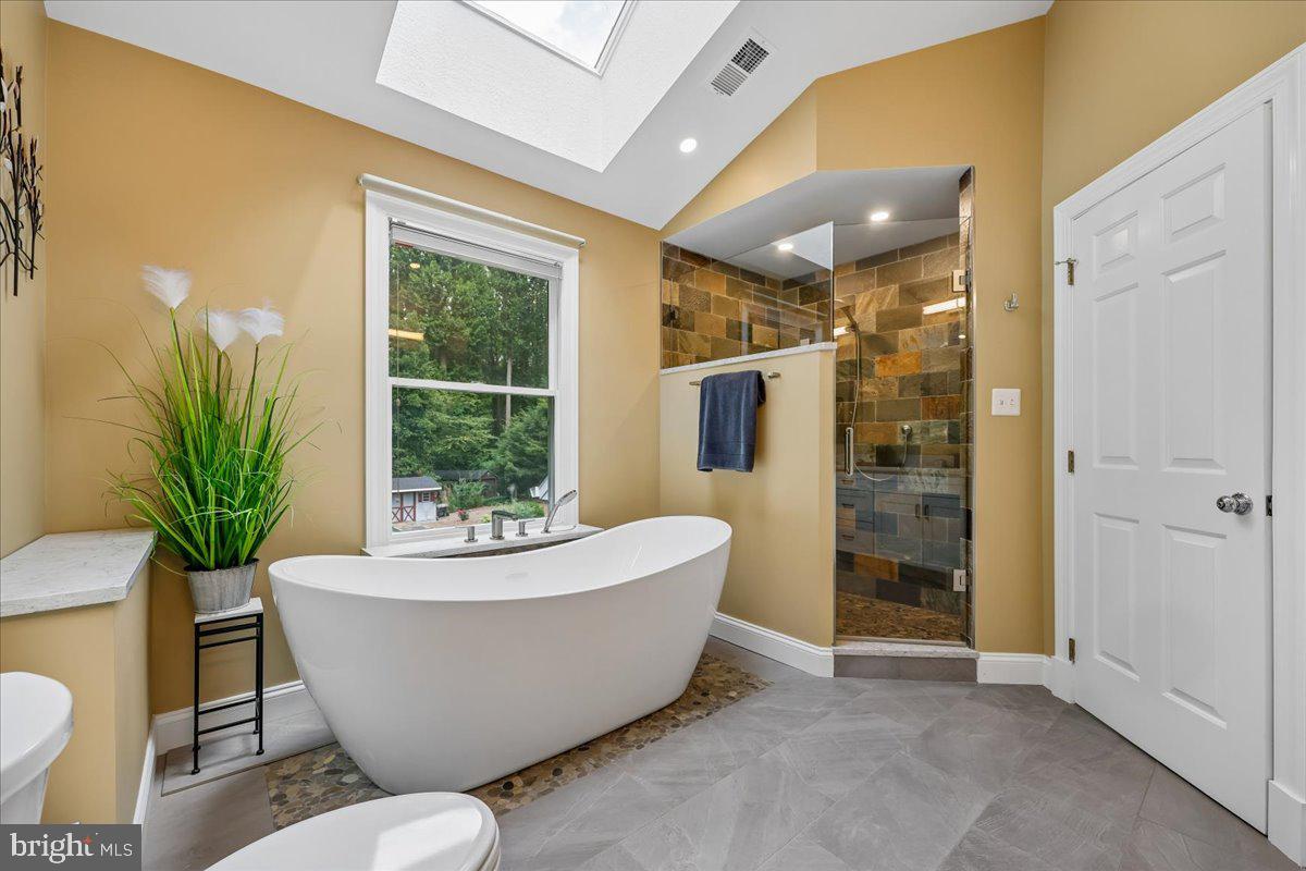 13121 Esworthy Road North Potomac, MD 20878 - Photo 22 of 65 Primary Bathroom with Tub and Separate Shower