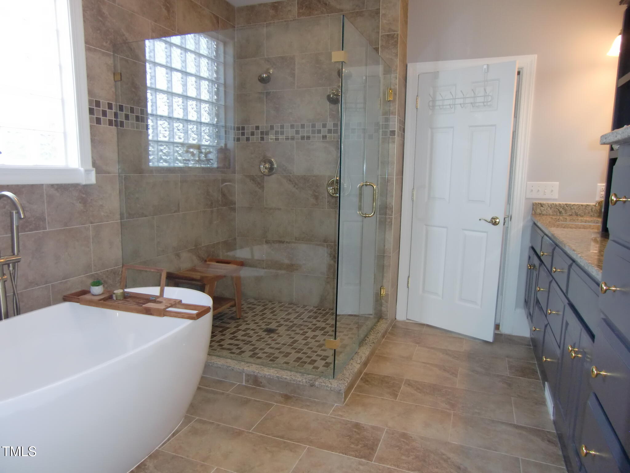 325 Sandy Ridge Road Dunn, NC 28334 - Photo 57 of 97 Freshly Upgraded Tile Shower, Soaking Tub, and Toilet in 2021