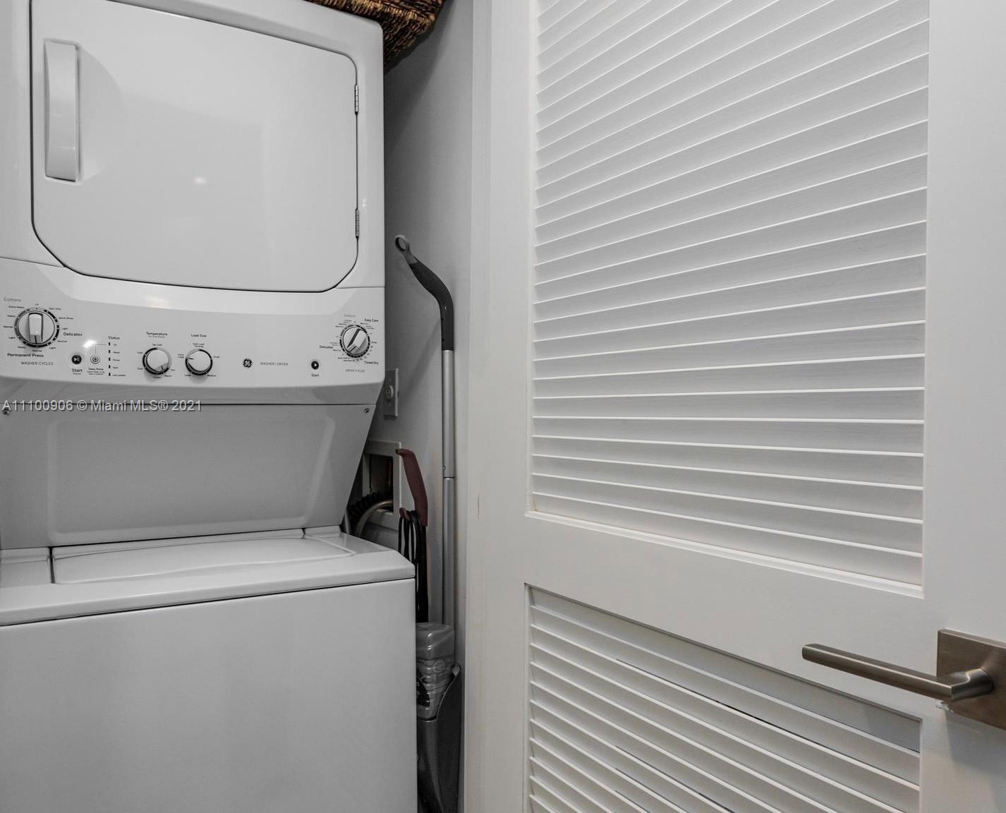 121 Northeast 34th Street, Unit L302 Miami, FL 33137 - Photo 10 of 10 a utility room with dryer and washer