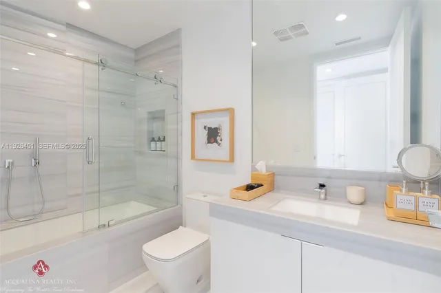 a view of a kitchen cabinets and a wooden floor