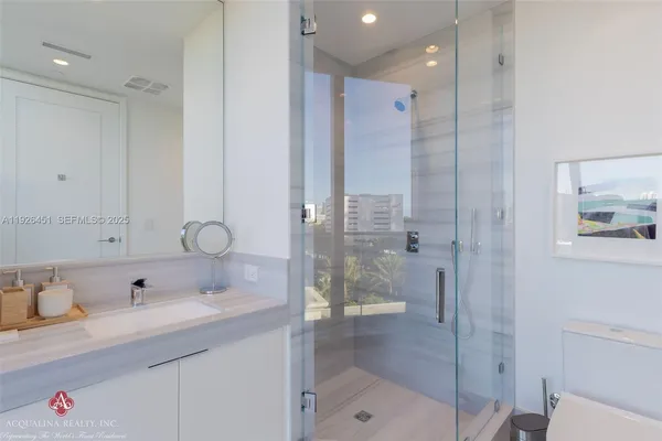 an outdoor space with pool and chairs