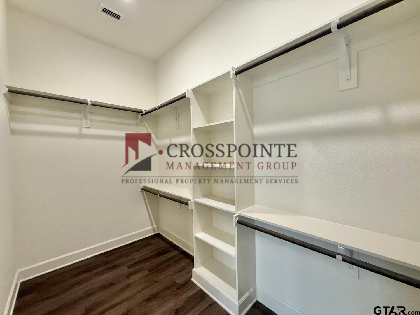 548 West Erwin Street Tyler, TX 75702 - Photo 20 of 27 a hallway with table