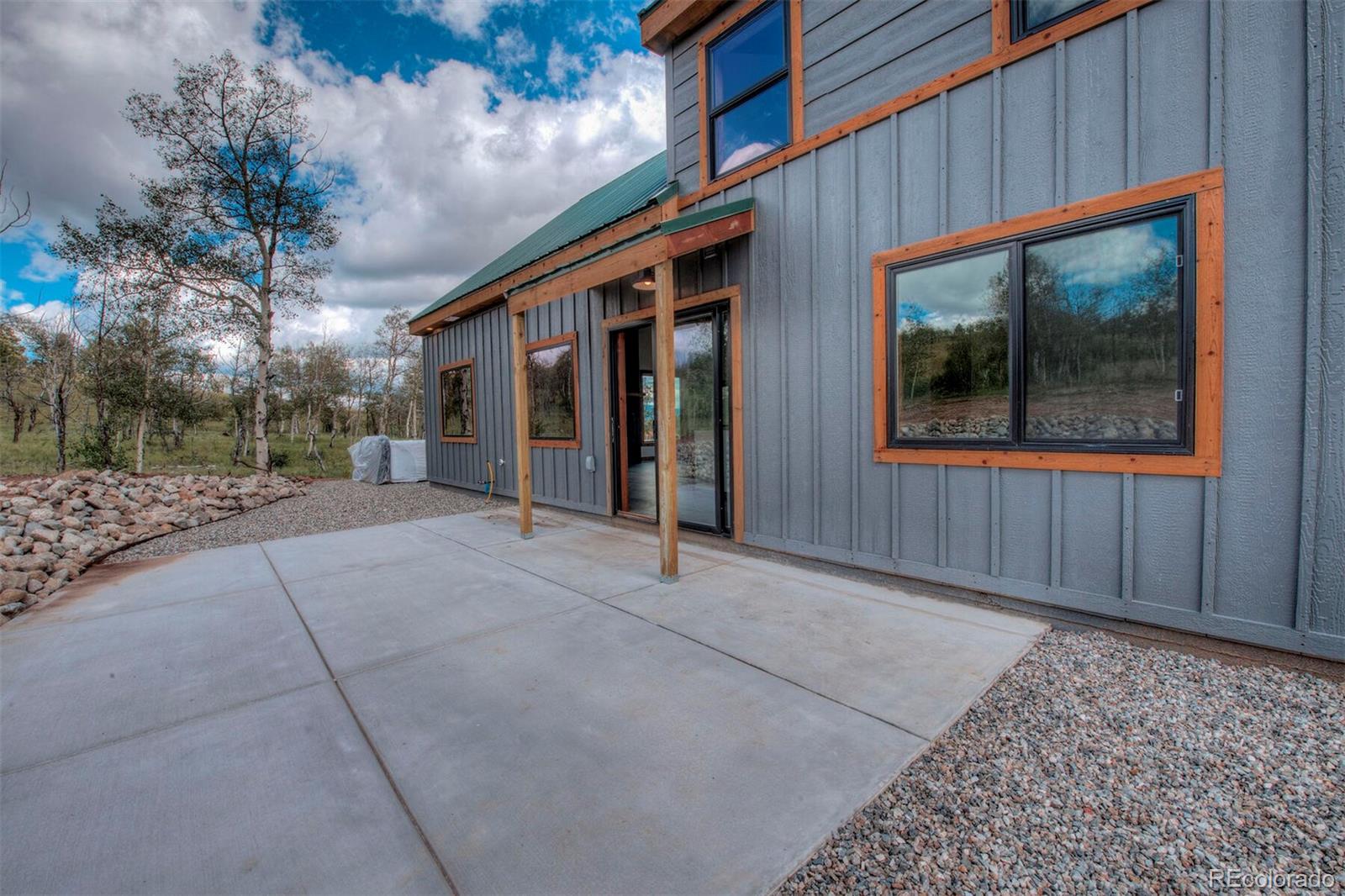 203 High Creek Road Fairplay, CO 80440 - Photo 3 of 30 a backyard of a house with seating space