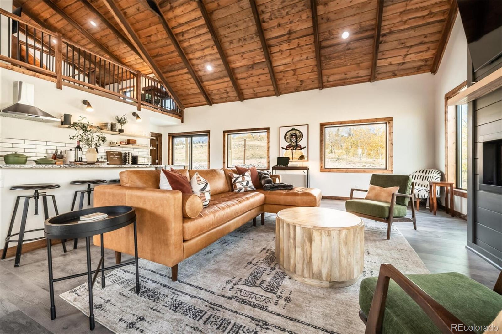 203 High Creek Road Fairplay, CO 80440 - Photo 6 of 30 a living room with furniture wooden floor and dining table