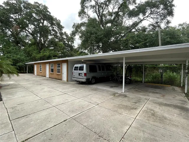 a view of house with outdoor space and porch
