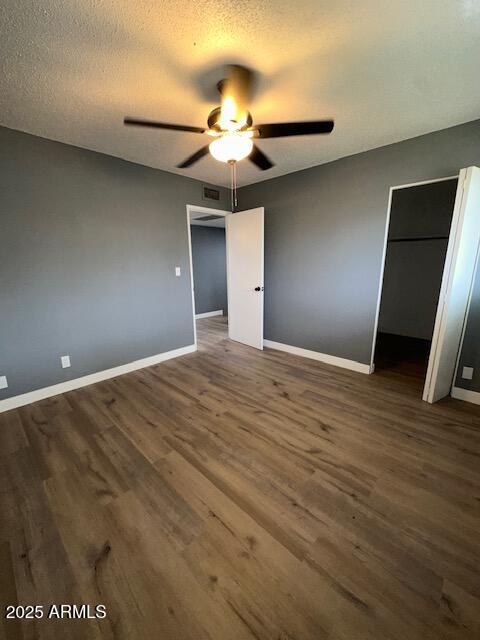 2551 West Berridge Lane, Unit D6 Phoenix, AZ 85017 - Photo 14 of 20 a view of an empty room with a ceiling fan