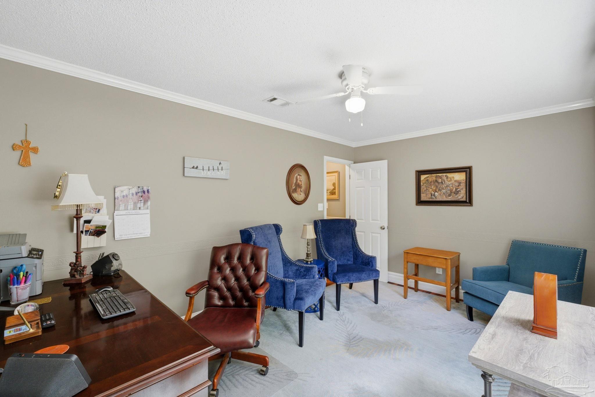 6930 Summit Way Milton, FL 32570 - Photo 32 of 71 a view of a workspace with furniture and a couch