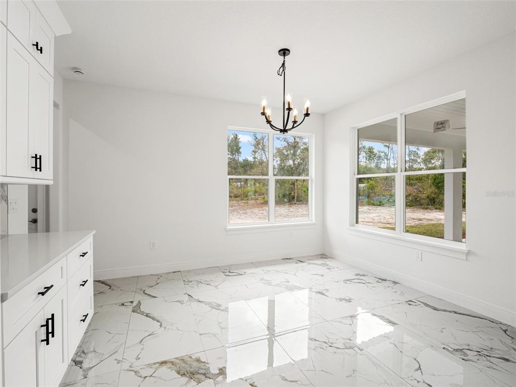 42430 Fir Street Eustis, FL 32736 - Photo 18 of 44 a very nice looking room with a window