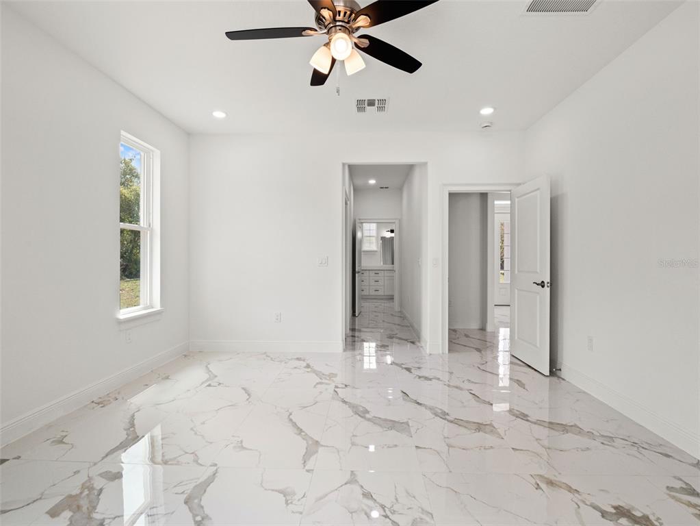 42430 Fir Street Eustis, FL 32736 - Photo 28 of 44 a view of an empty room and window