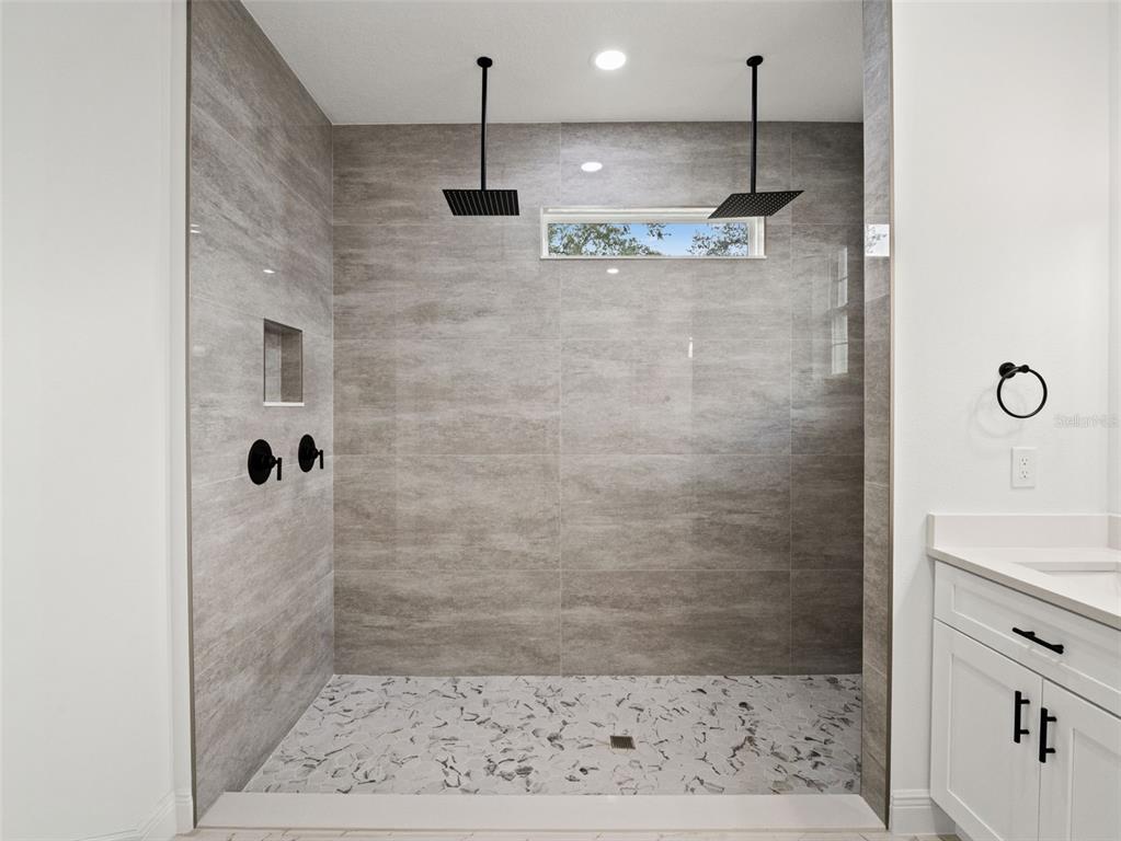 42430 Fir Street Eustis, FL 32736 - Photo 31 of 44 a bathroom with a shower