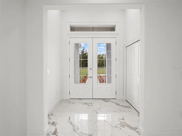 an empty room with windows