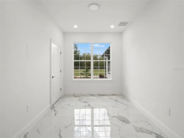 an empty room with a window