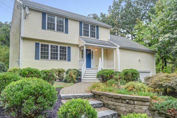 5 Garrison Road Shirley, MA 01464 - Photo 1 of 29 a view of a house with a yard plants and large tree