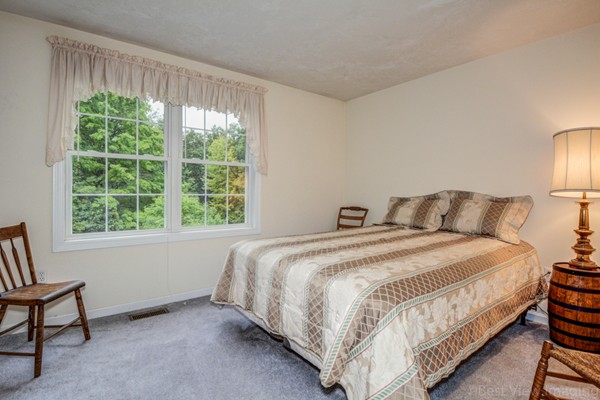 5 Garrison Road Shirley, MA 01464 - Photo 13 of 29 a bedroom with a bed and a window
