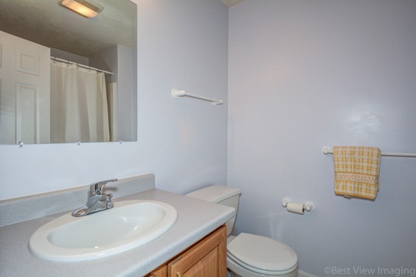 5 Garrison Road Shirley, MA 01464 - Photo 21 of 29 a bathroom with a sink a toilet and a mirror