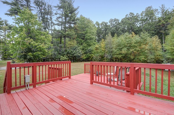 5 Garrison Road Shirley, MA 01464 - Photo 24 of 29 a balcony with wooden floor and fence