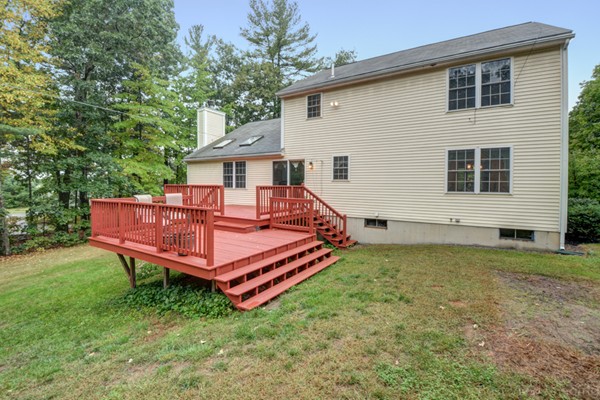 5 Garrison Road Shirley, MA 01464 - Photo 26 of 29 a view of a house with a yard chairs and a patio