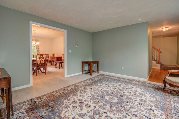 5 Garrison Road Shirley, MA 01464 - Photo 4 of 29 a view of a livingroom with wooden floor and a window